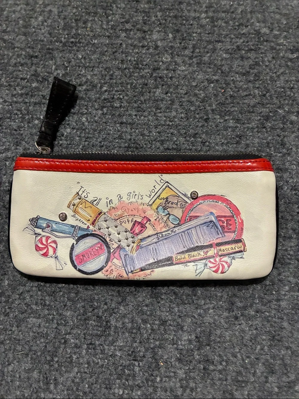 👜 Brighton Cream Cosmetic Pouch with Red Trim and Illustrated Makeup Motif